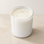 Luxe XL candle from an elevated angle showing three wicks
